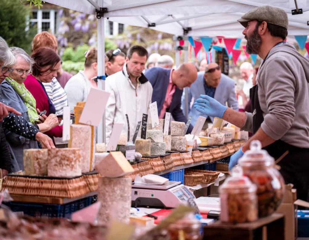 People browsing local food stall at an EAT festival