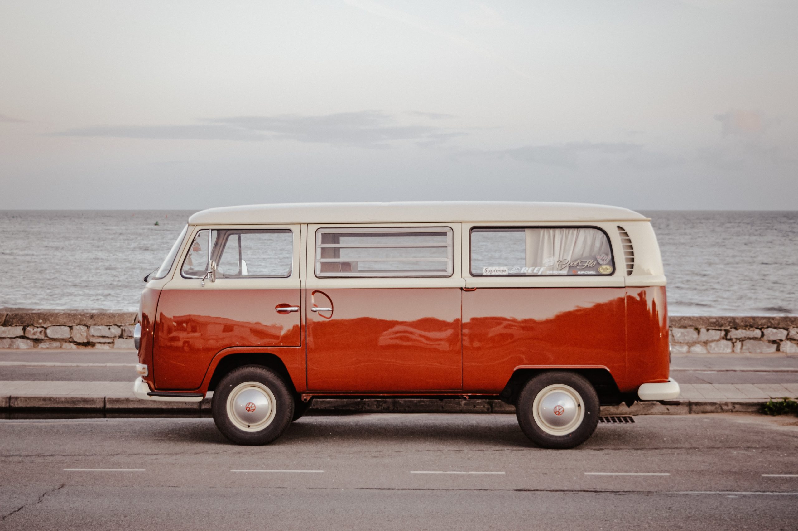 Red and white VW Camper van