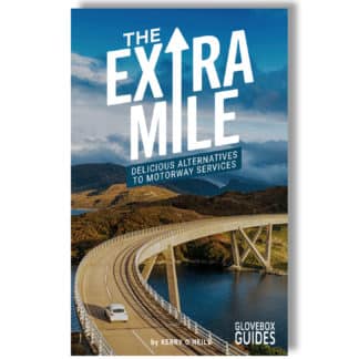 Cover of The Extra Mile Guide edition 4 with bridge and car