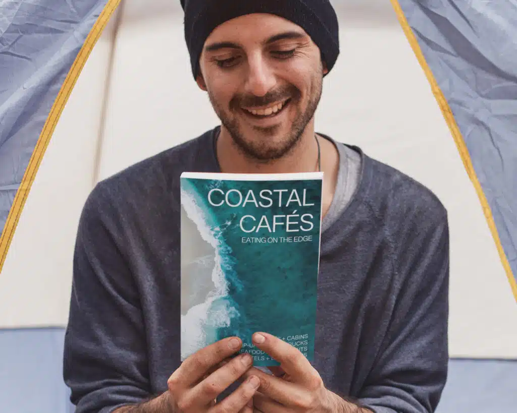Man with Coast book