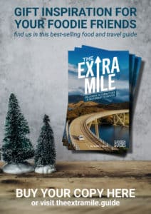 The Extra Mile 4 Christmas posters with Christmas tree and book image